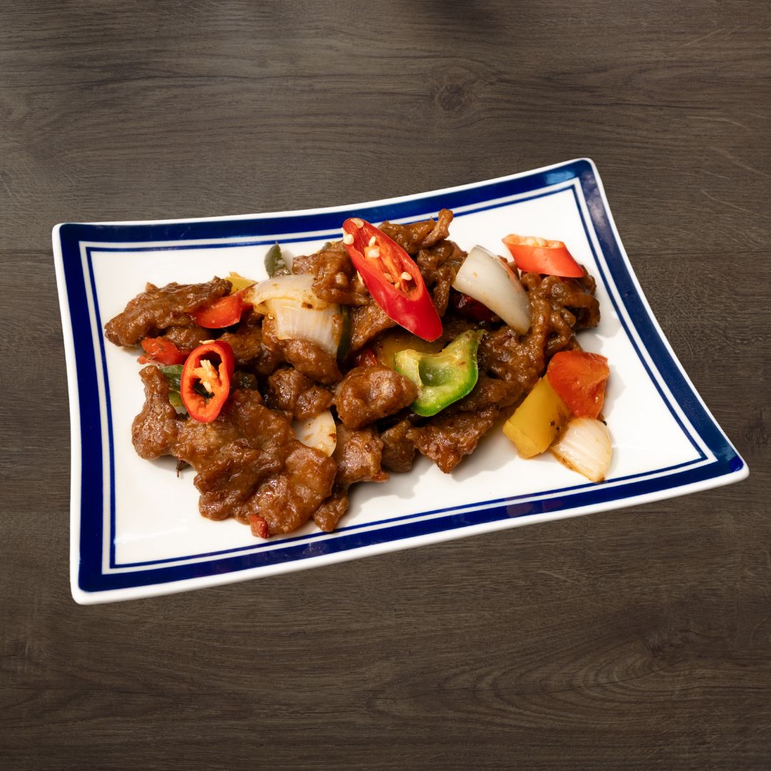 Wok Fried Mala Beef Sliced with Trio Peppers & Onion